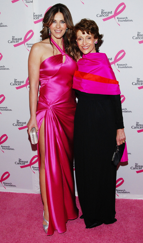 Evelyn Lauder, daughter-in-law of Estee Lauder (left) and actress and model  Elizabeth Hurley talk to customers during the launch of Lauder's new  photography book, An Eye For Beauty at Bloomingdale's in New