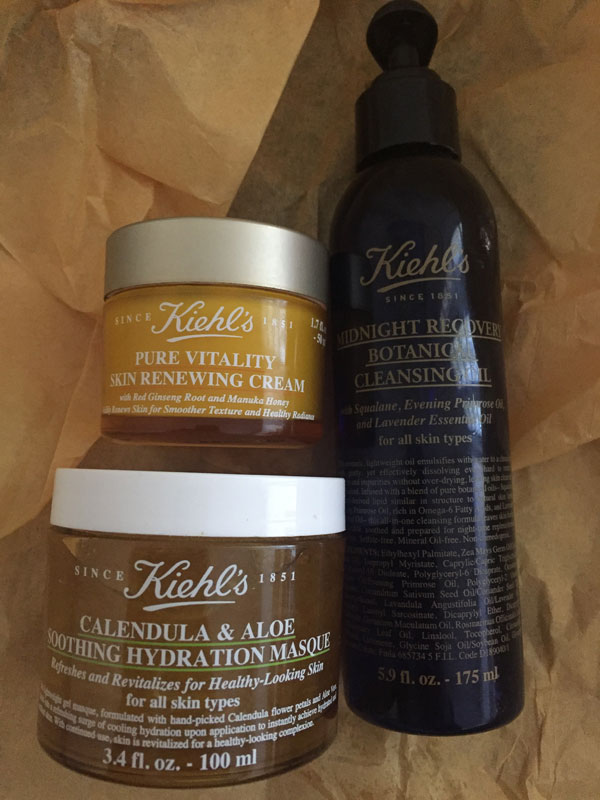 Kiehl's Calendula & Aloe Soothing Hydration Masque, Pure Vitality Skin Renewing Cream, and Midnight Recovery Botanical Cleansing Oil.